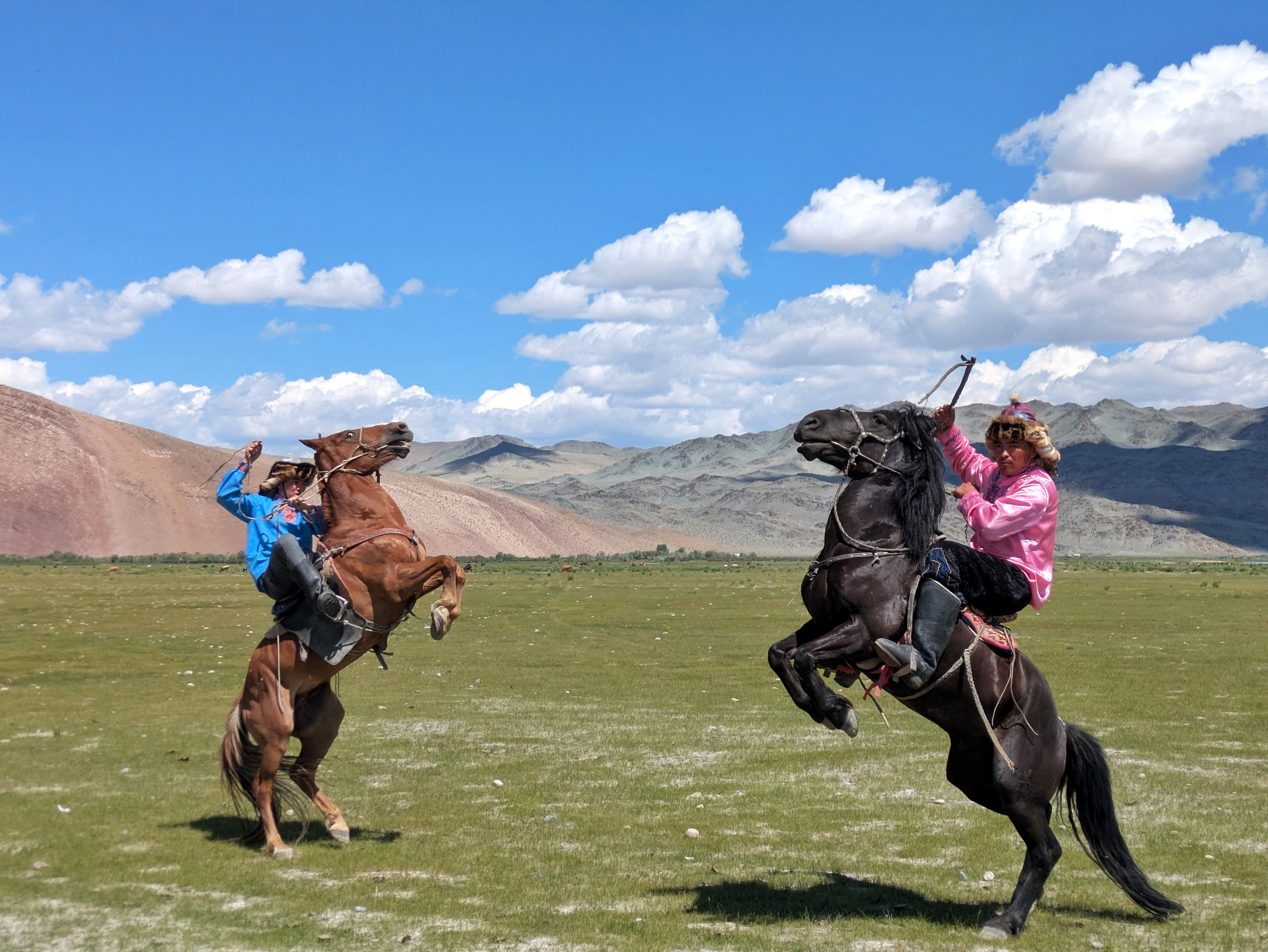 Eagle hunters on horseback